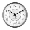 Modern white wall clock with large black numerals and minimalist analog design