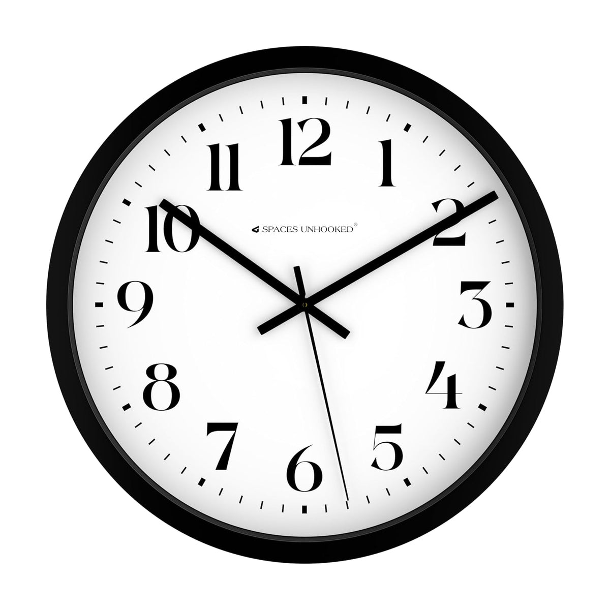 Wall clock with black frame and white face on a white background