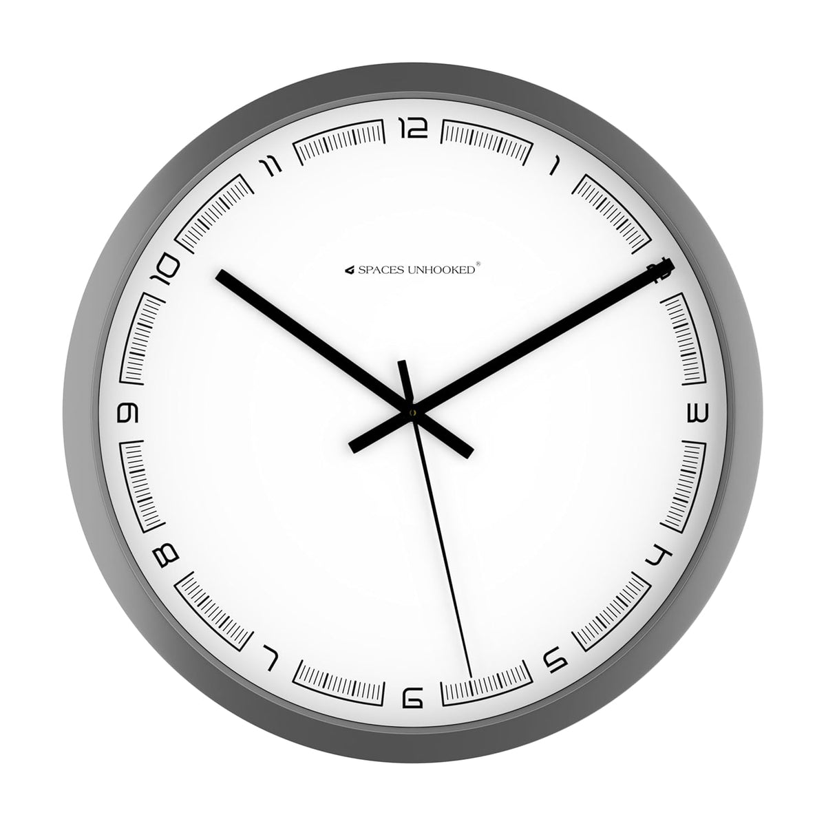 Wall clock with black hands and white face on a gray background