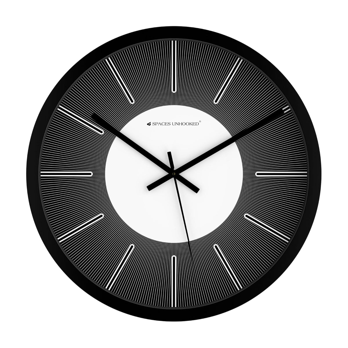 Modern black and white wall clock with radial line design and minimalist center dial