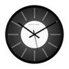 Modern black and white wall clock with radial line design and minimalist center dial
