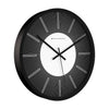 Minimalist black wall clock with fine line detailing and bold modern aesthetic