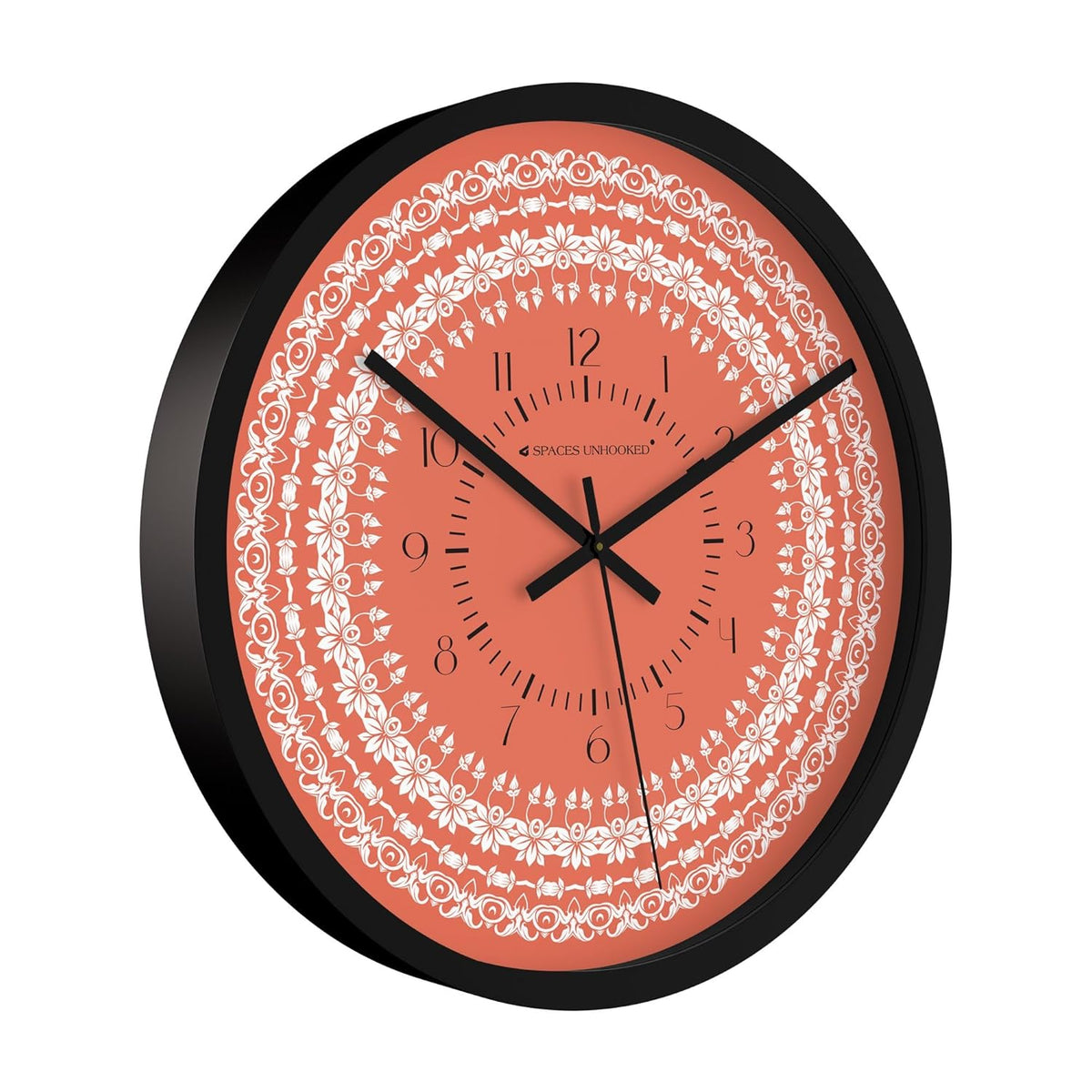 Modern decorative wall clock with orange dial and white ornamental design