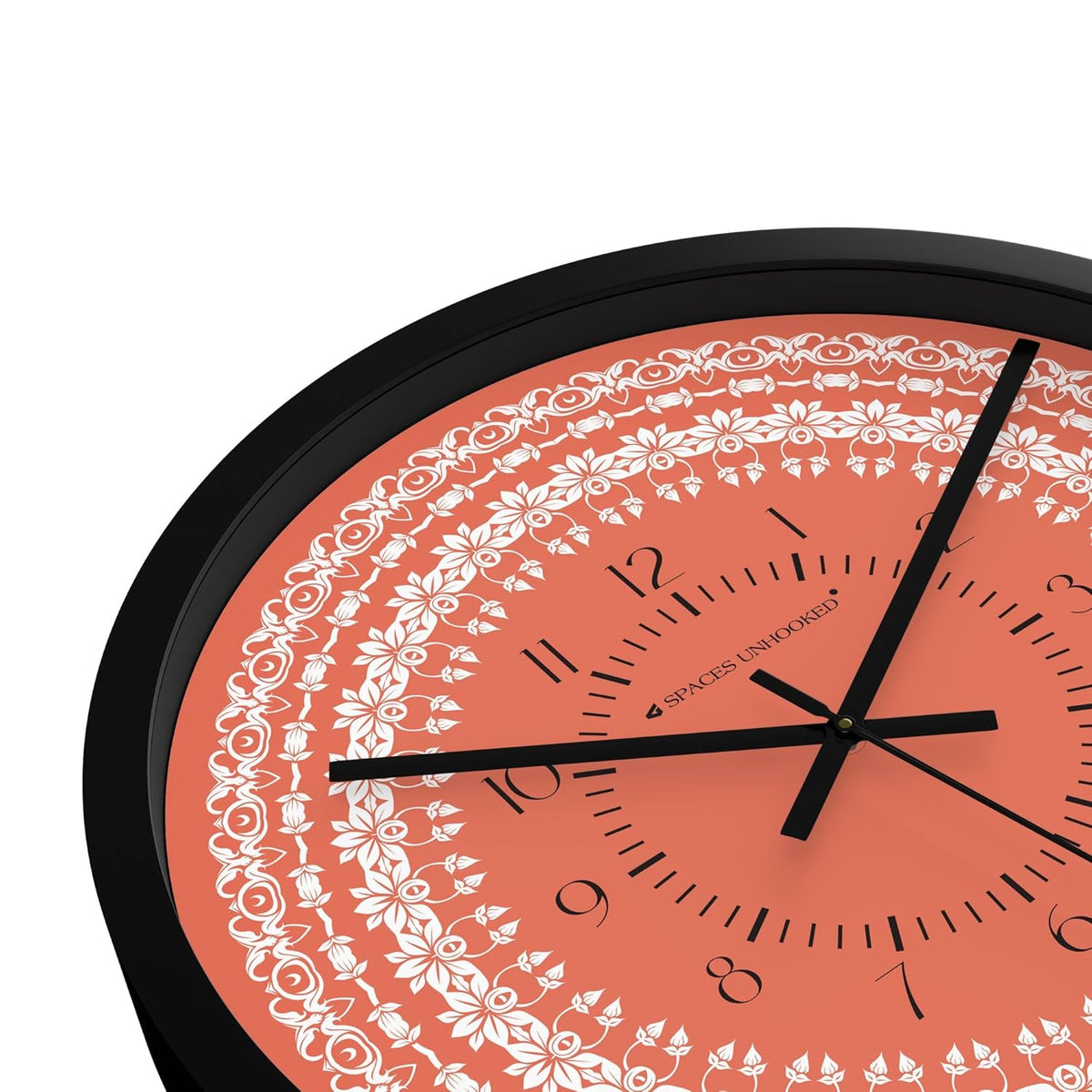 Round wall clock with ethnic floral motif and contemporary black frame