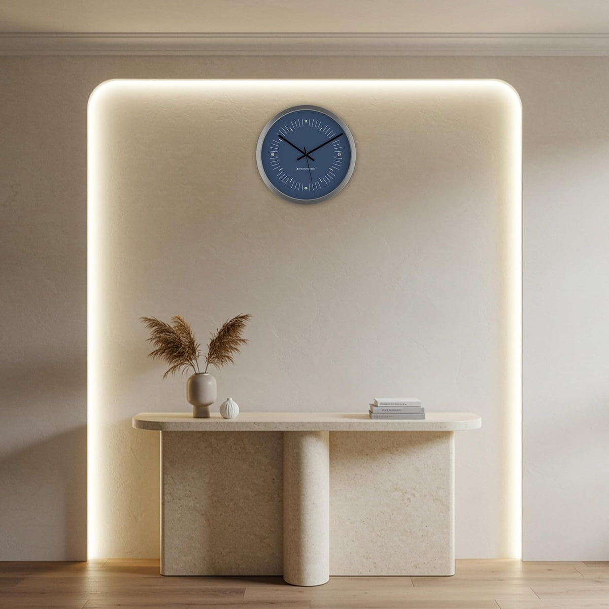 Minimalist blue wall clock mounted above a modern console table with soft LED backlighting