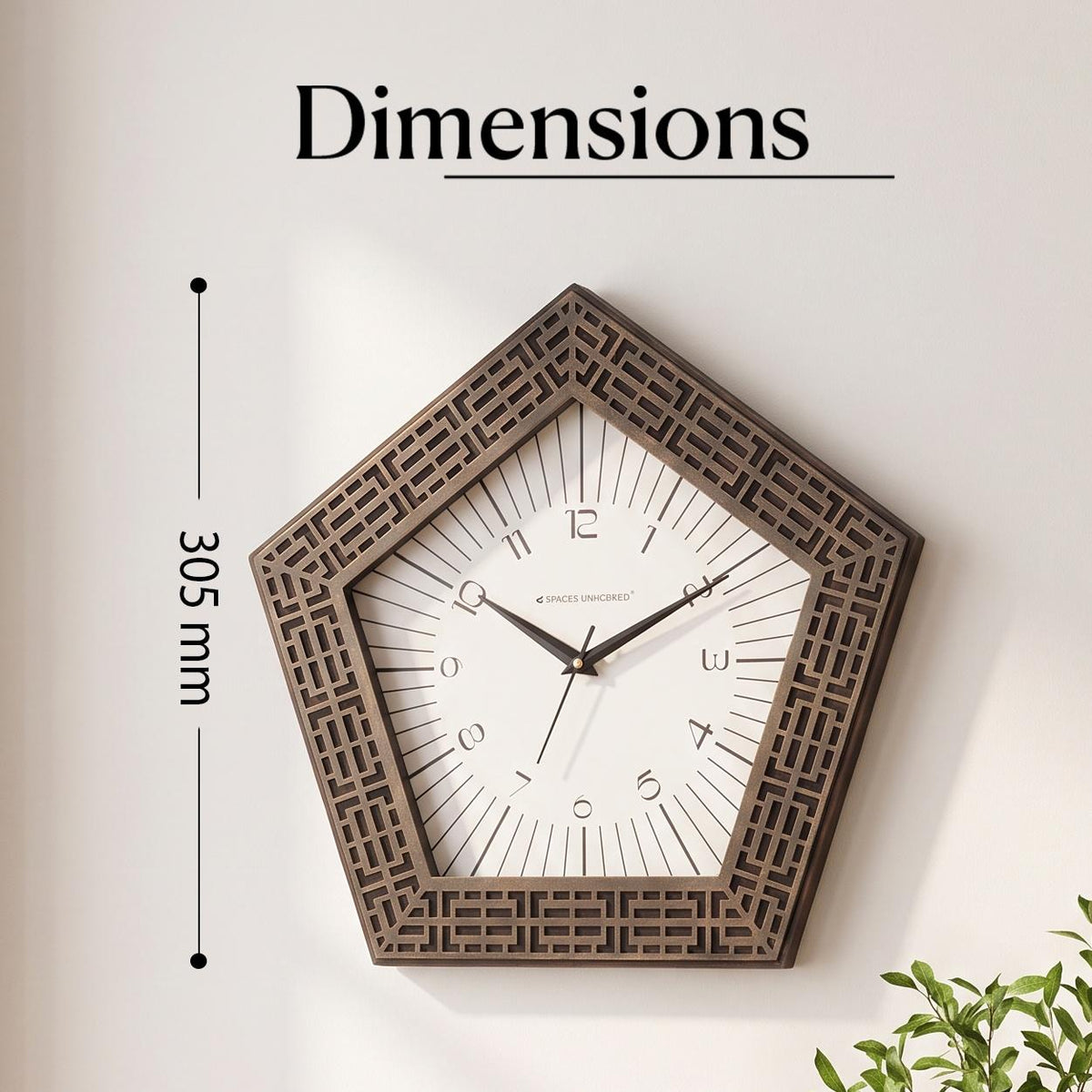 Pentagon bronze wall clock on a living room wall above a sofa