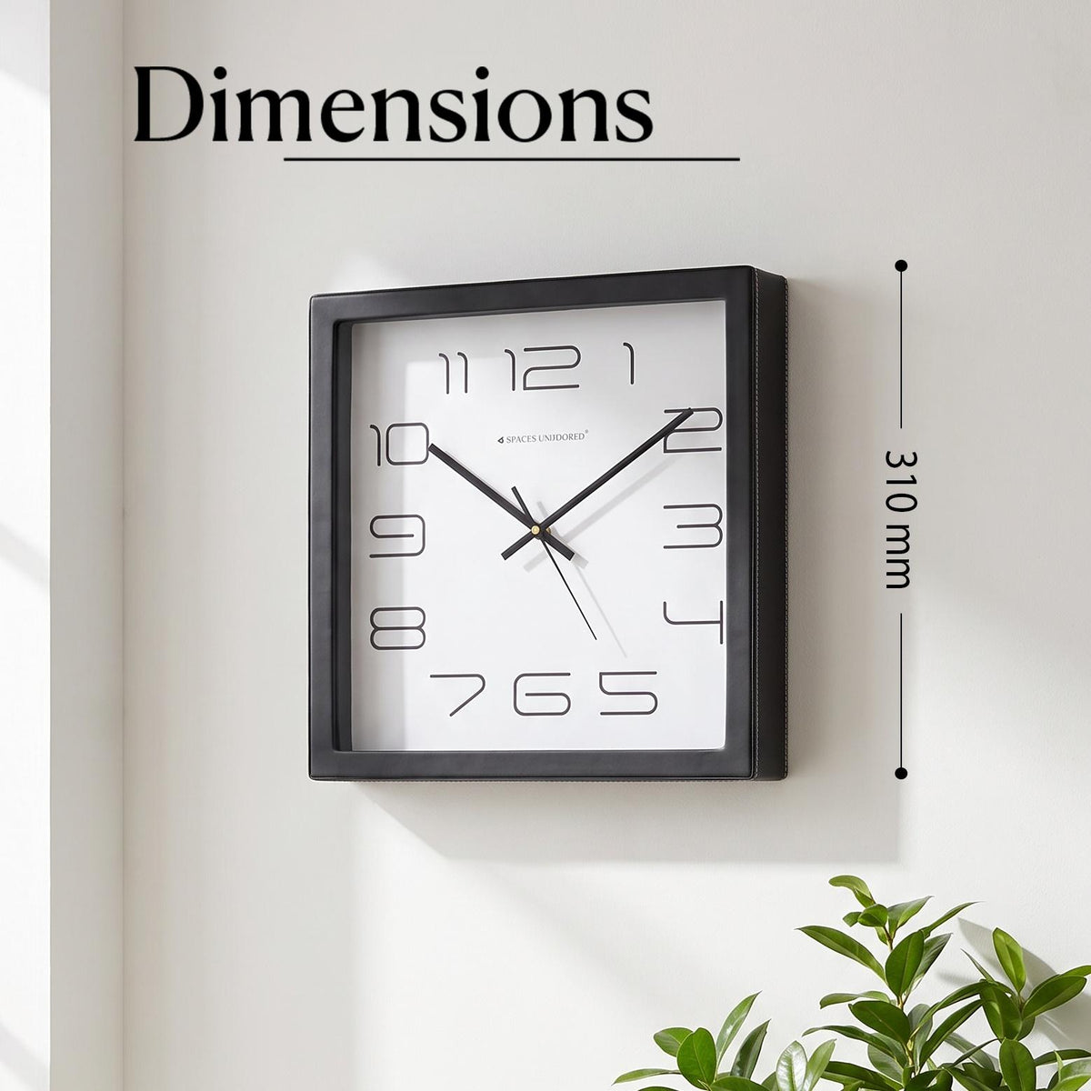 Close-up of fine outlined numbers 1 to 12 on a plain white clock dial