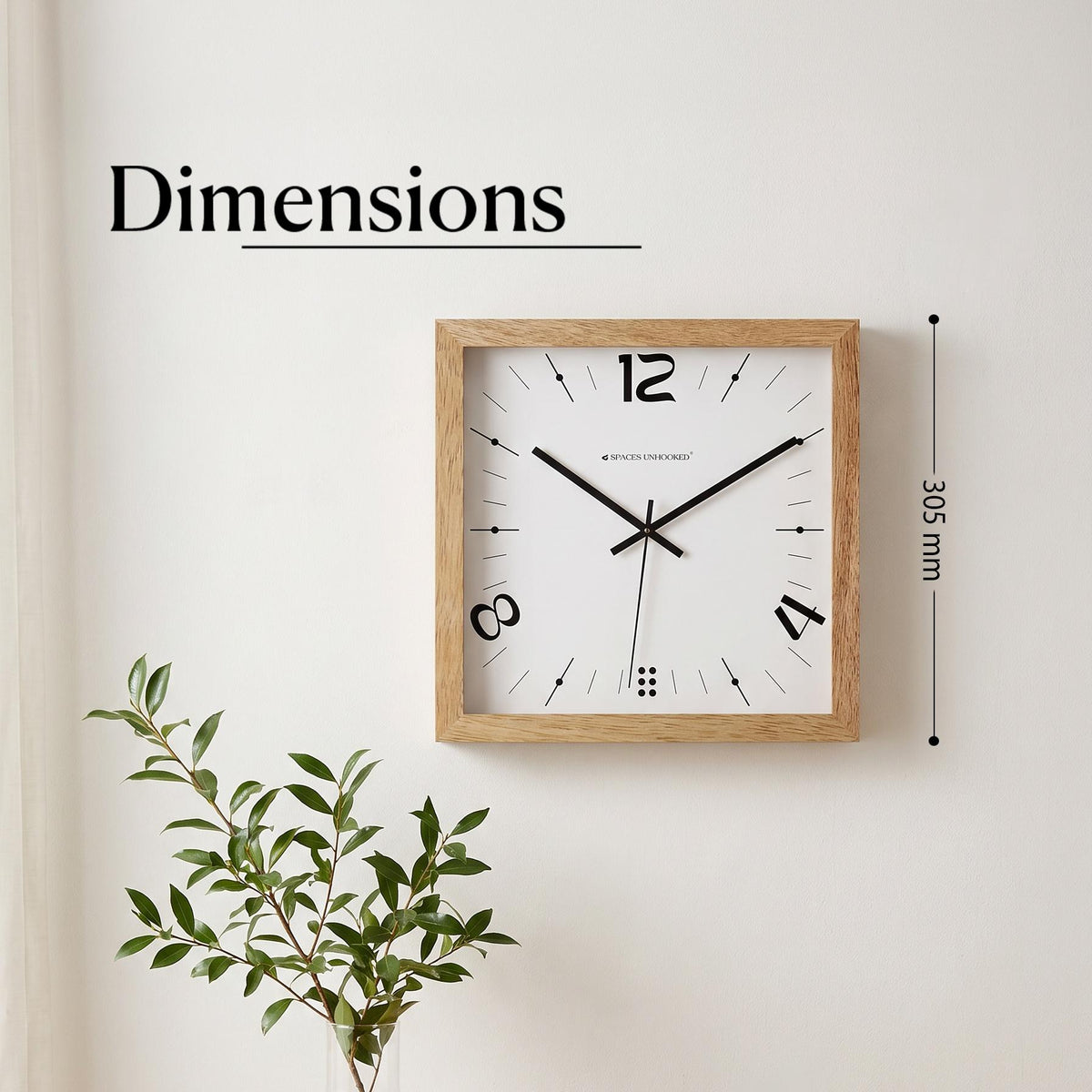 Minimal oak square wall clock in a Japandi bedroom with linen bedding and ceramic decor
