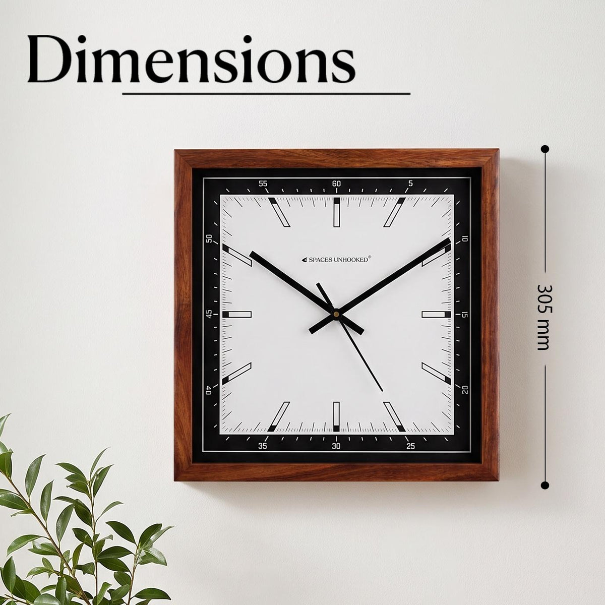 Close-up of the black bezel with white minute scale numbered 5 to 60 on a square wall clock