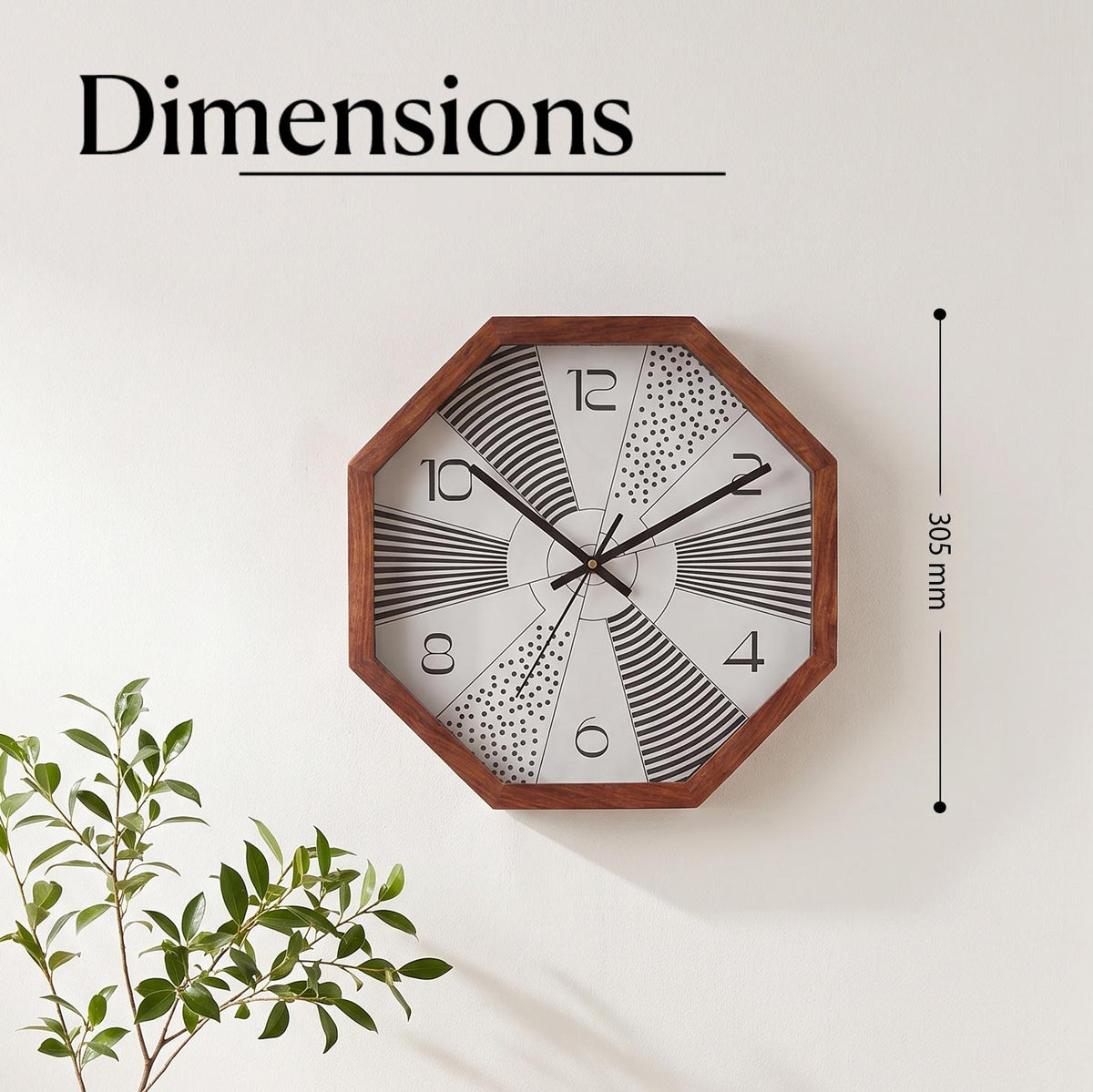 Close-up of sunburst wedges filled with black stripes and dots on a white octagonal clock dial