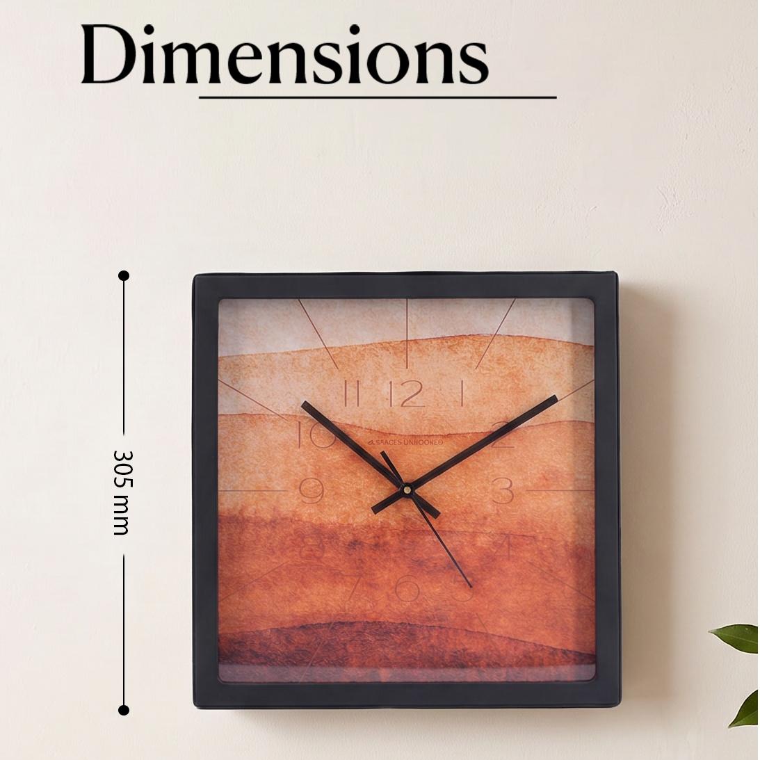 Close-up of terracotta and amber watercolour bands with faint numerals on a dial