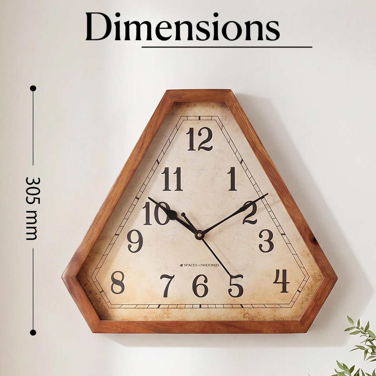 Close-up of aged parchment-style dial with crackle texture on a vintage triangular wall clock