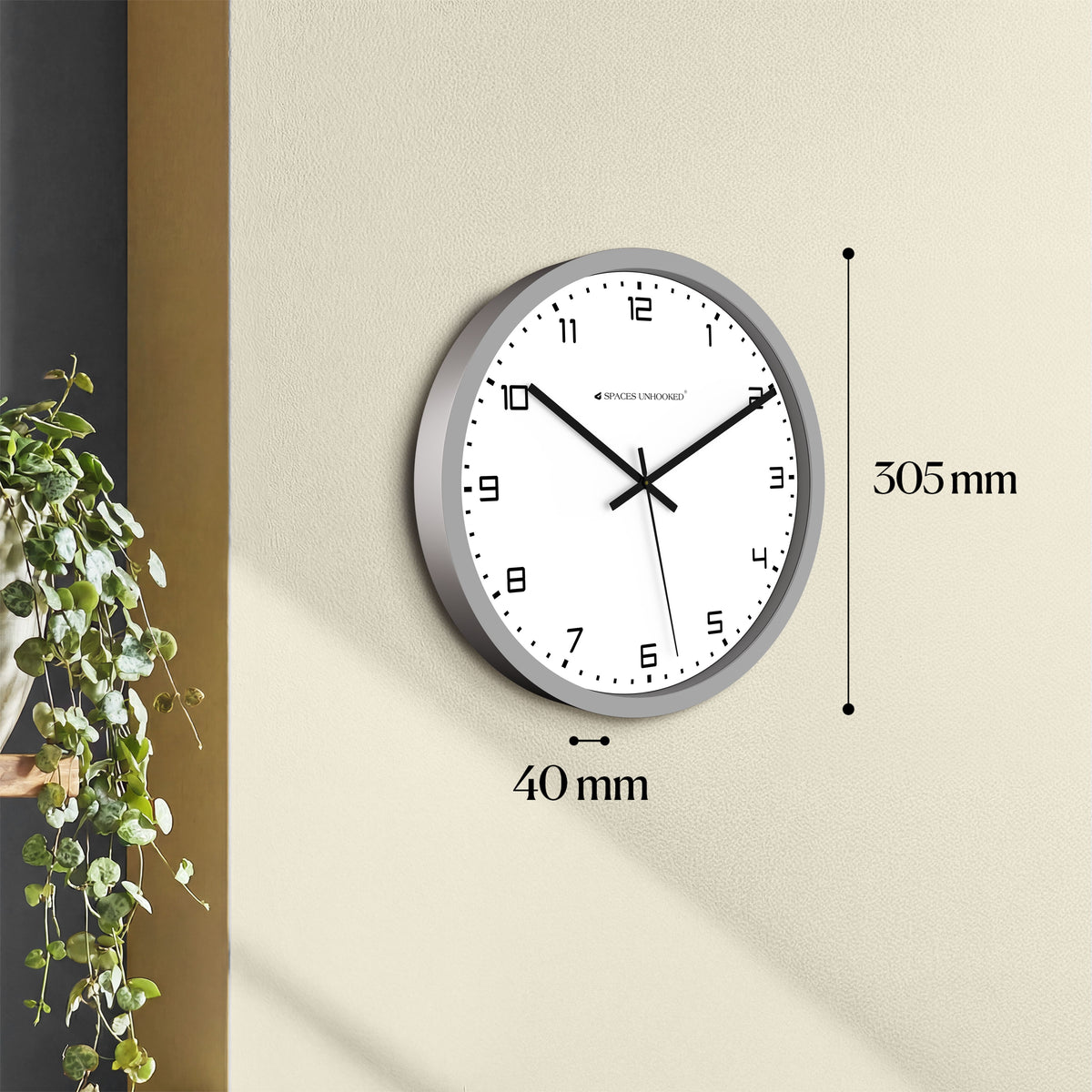 Detail shot silver circular frame round wall clock – premium quality silent wall clock Spaces Unhooked