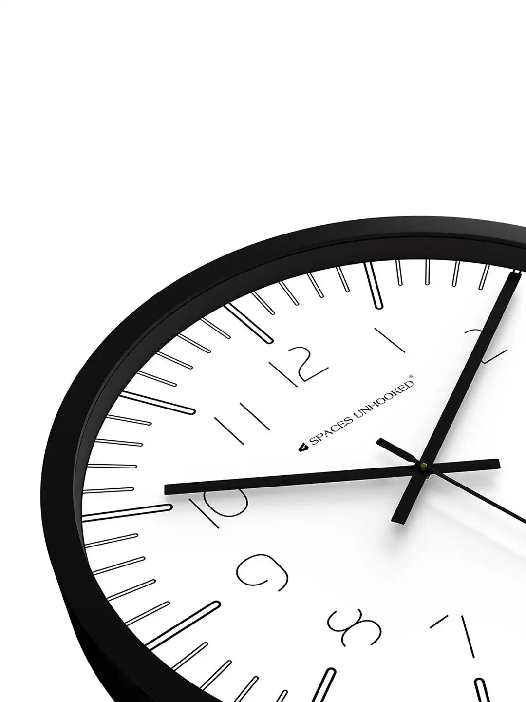 Spaces Unhooked black wall clock with premium branded packaging box for secure delivery