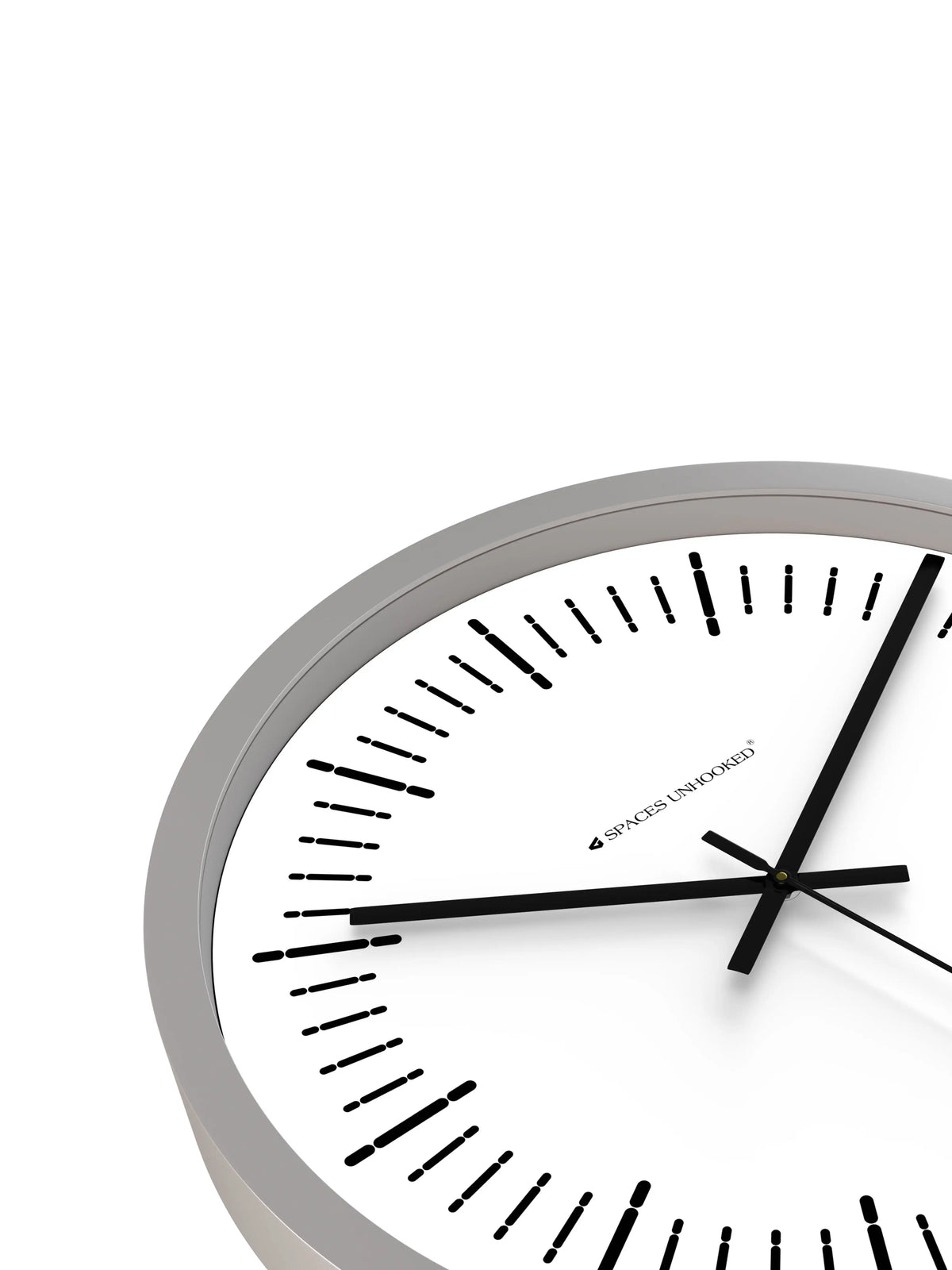 Down Front – Close-up angle view of wall clock dial showing minimal tick markers