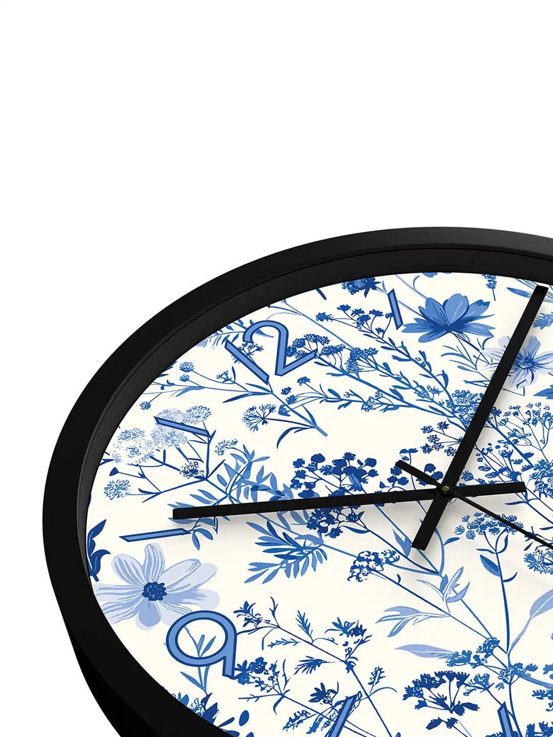 Down Front – Close-up angle view of wall clock dial showing blue floral pattern detailing