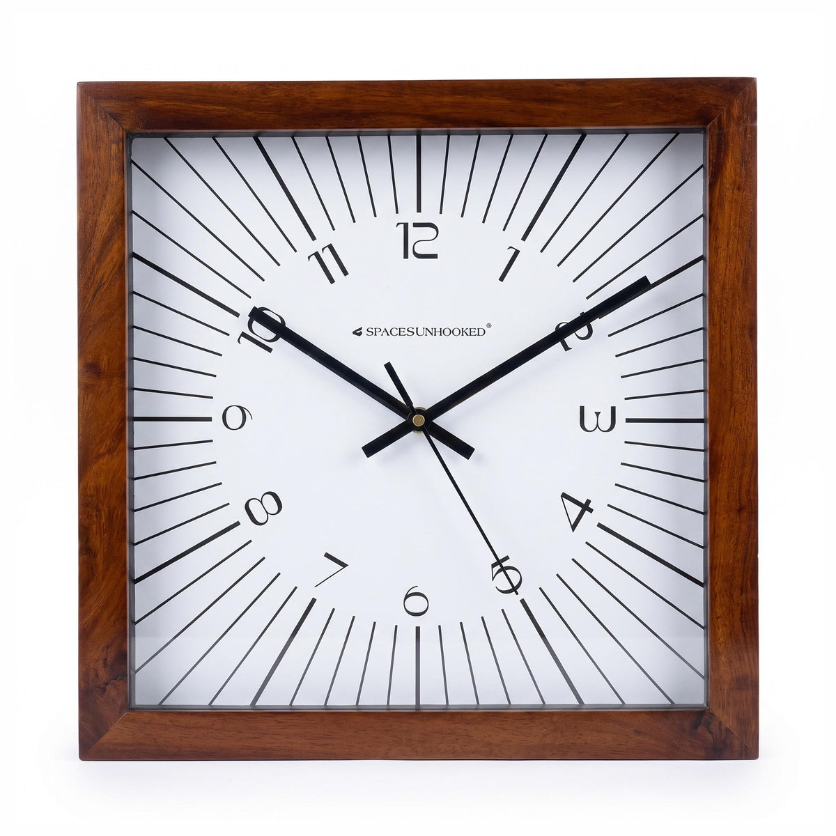 Radiating line square wooden wall clock above a console in a modern living room with art