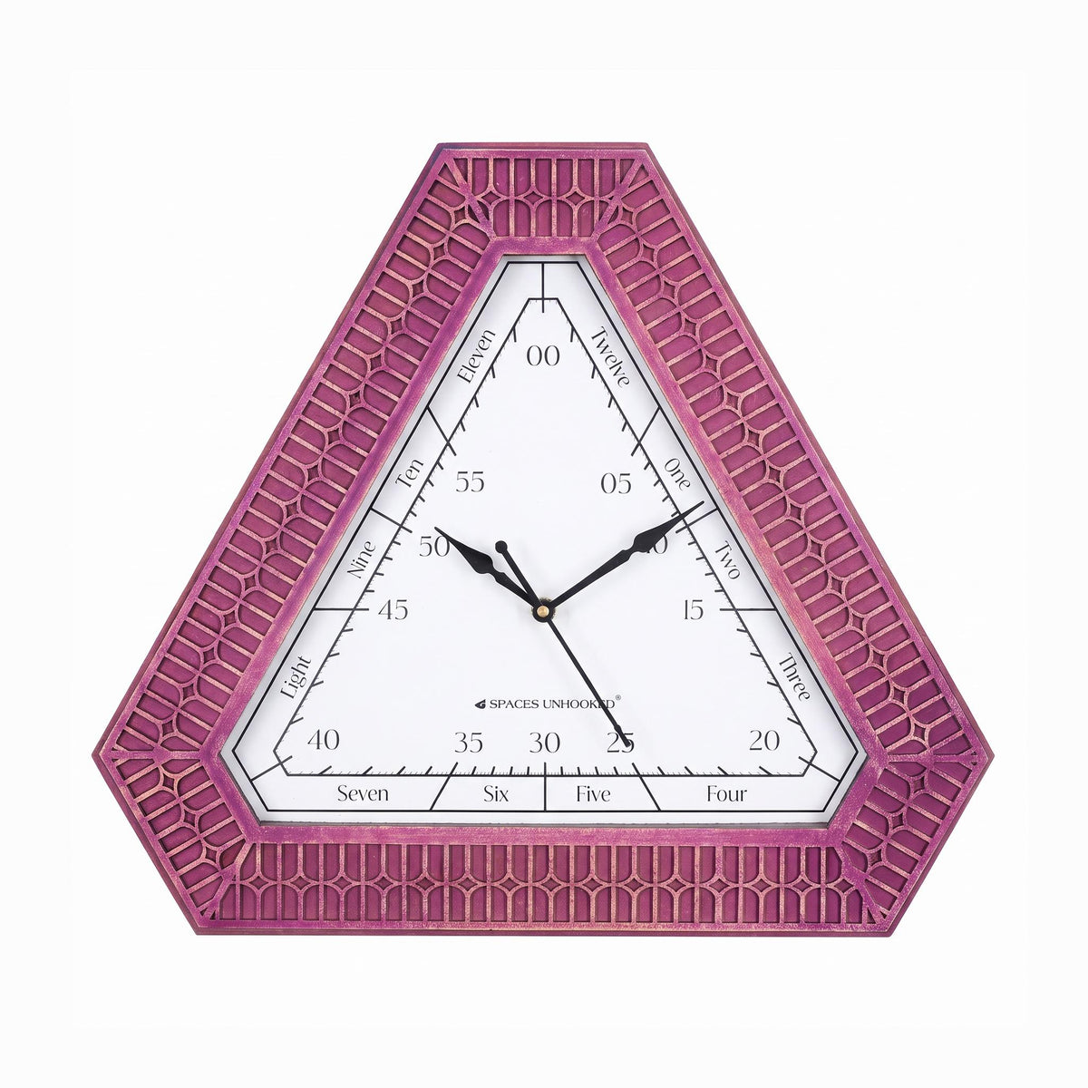 Triangular magenta wall clock on a feature wall in a bright living room