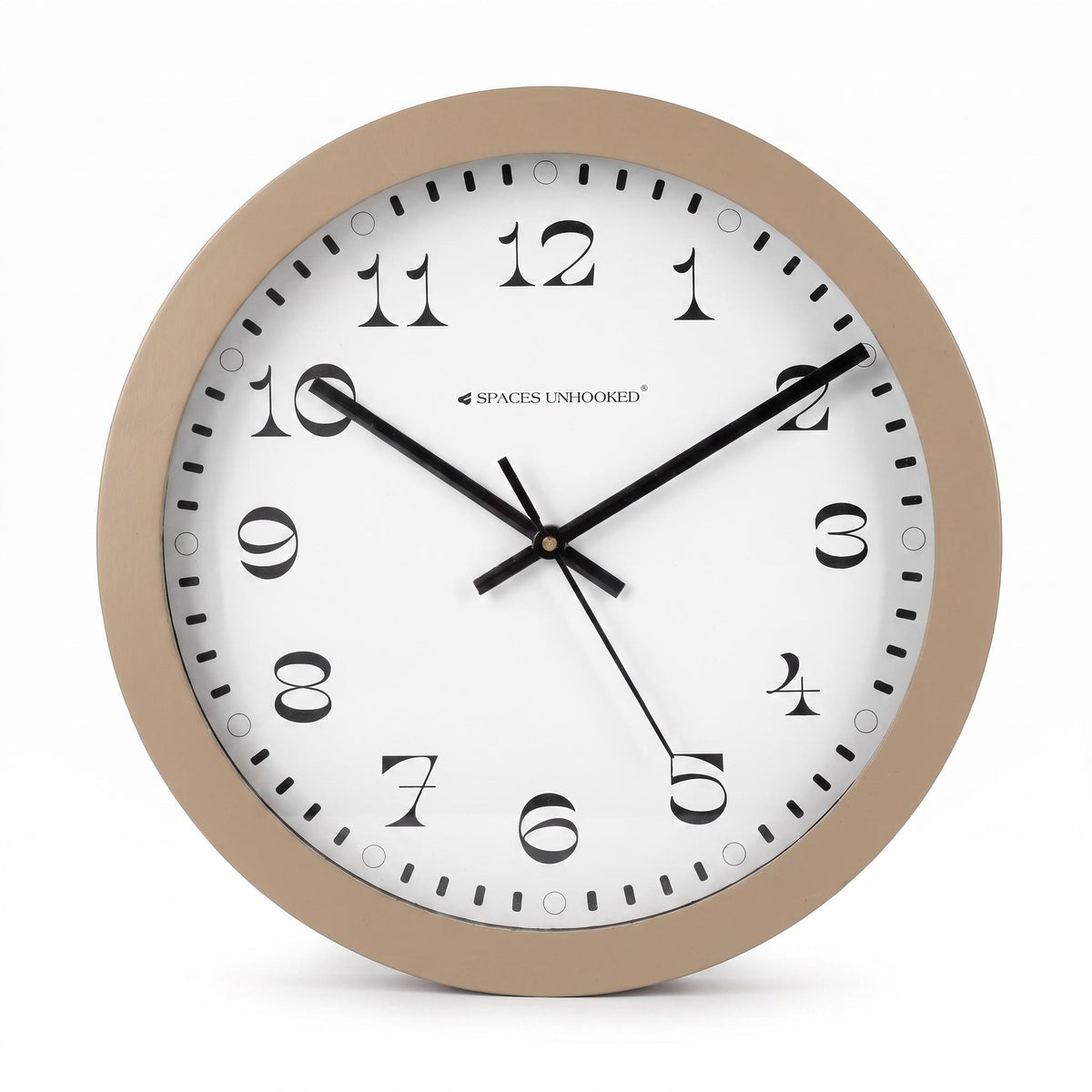 Taupe round wall clock in a living room with cream walls, linen sofa and wood decor