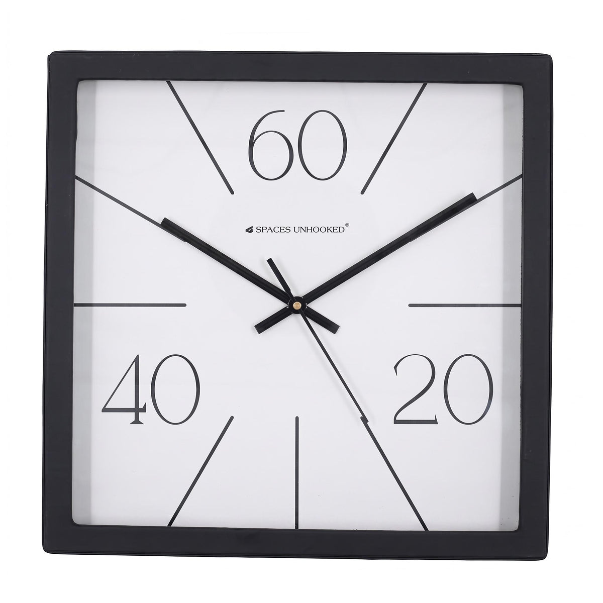 Radial line wall clock on a desk in a tidy home office