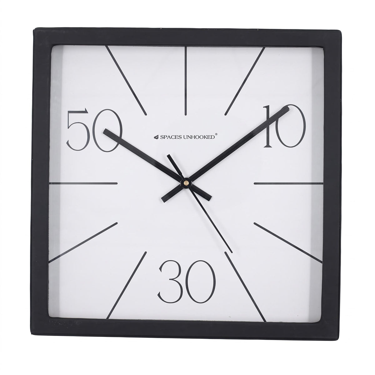 Radial line wall clock on a desk in a minimal home office