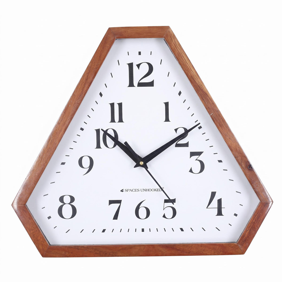 Classic triangle-shaped brown wall clock with white dial on a plain wall in a tidy home office