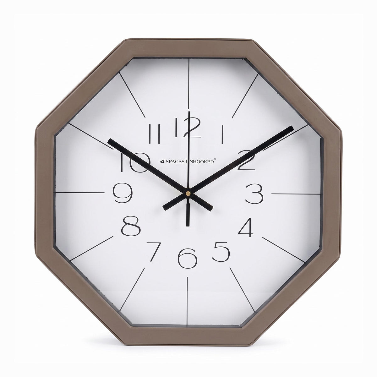 Taupe octagonal wall clock in a living room with warm neutral walls and pale wood