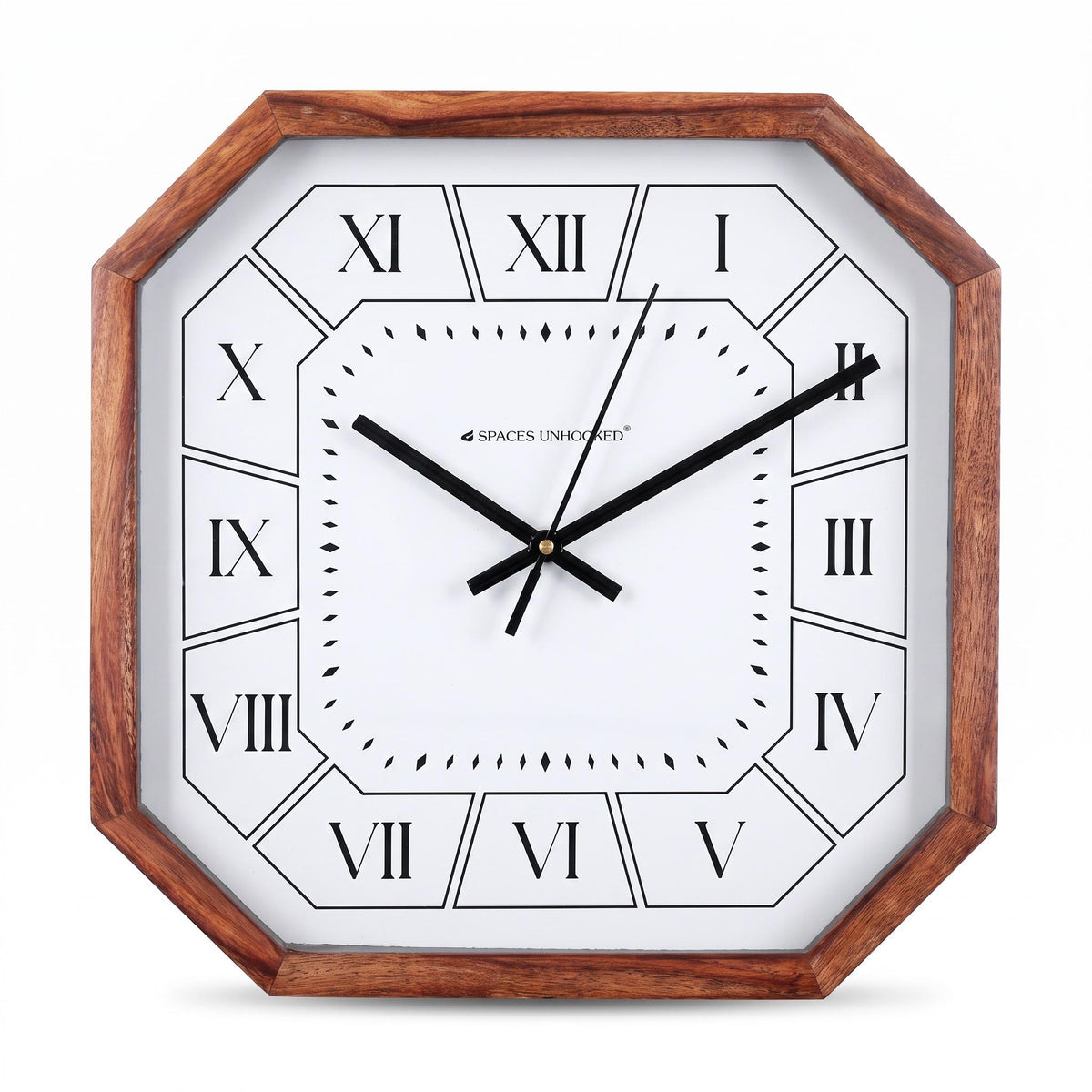 Octagonal wooden wall clock with Roman numerals on a quiet study wall beside a tall bookshelf