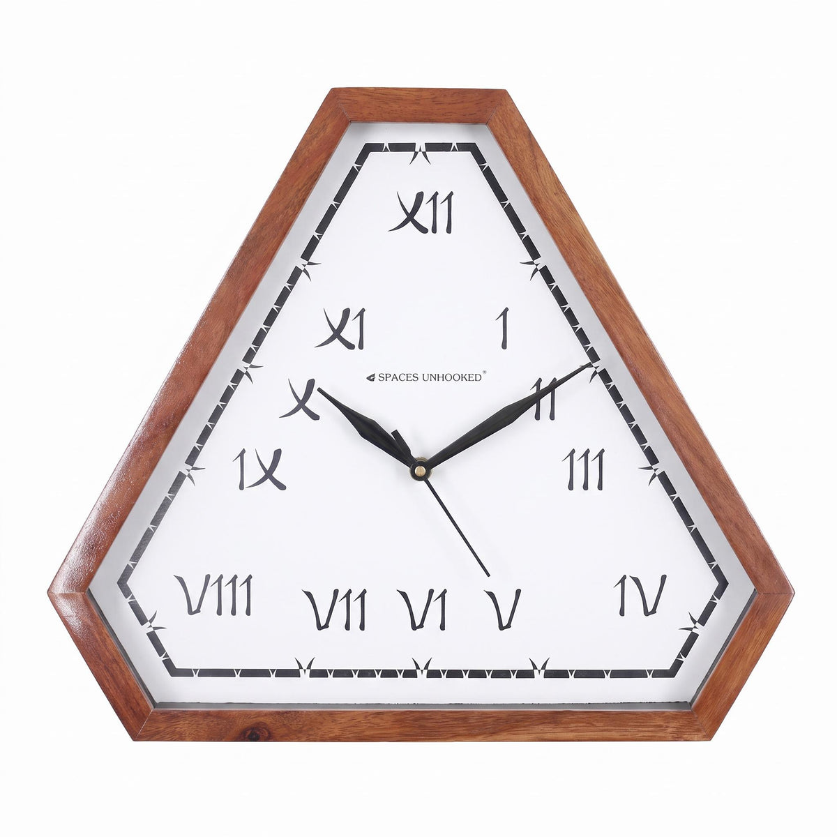 Triangular wooden wall clock with artistic Roman numerals in a study with books and art