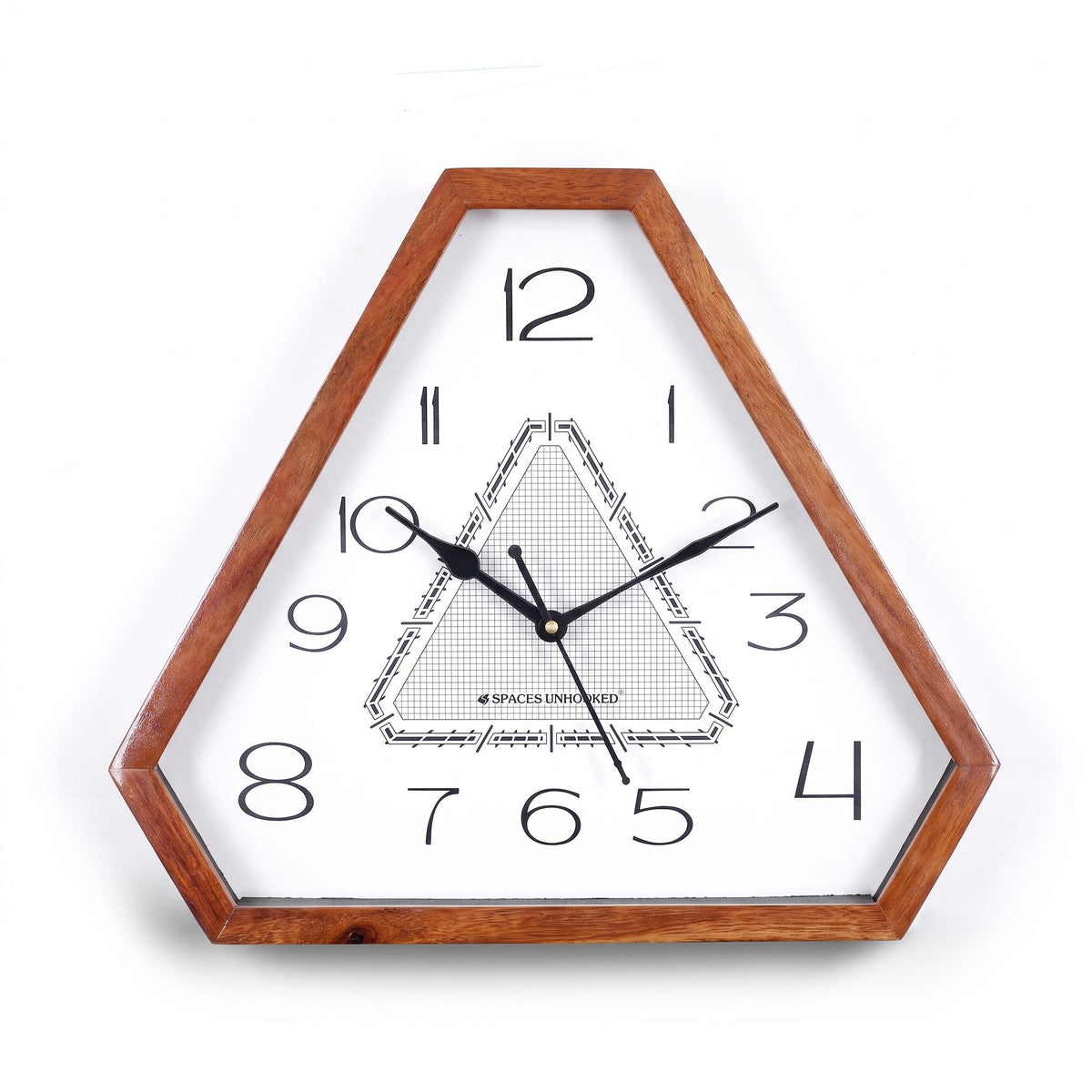 Triangular grid dial wall clock styled with a geometric rug and cushions in a modern lounge