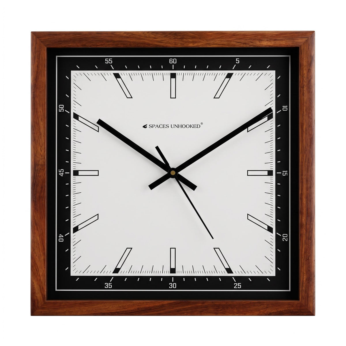 Modern square wooden wall clock with black and white dial on a grey living room wall