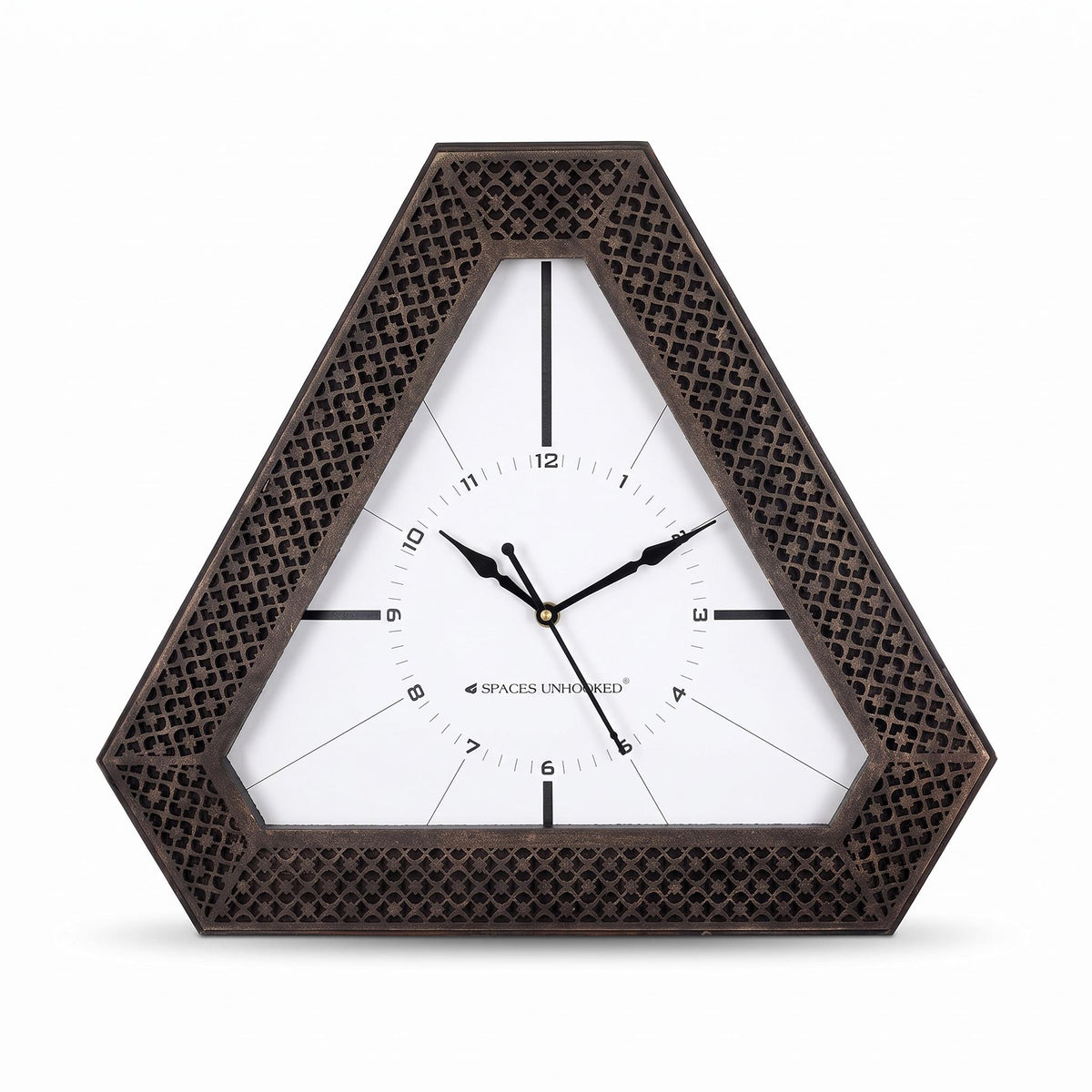 Triangular bronze wall clock on a feature wall in a living room