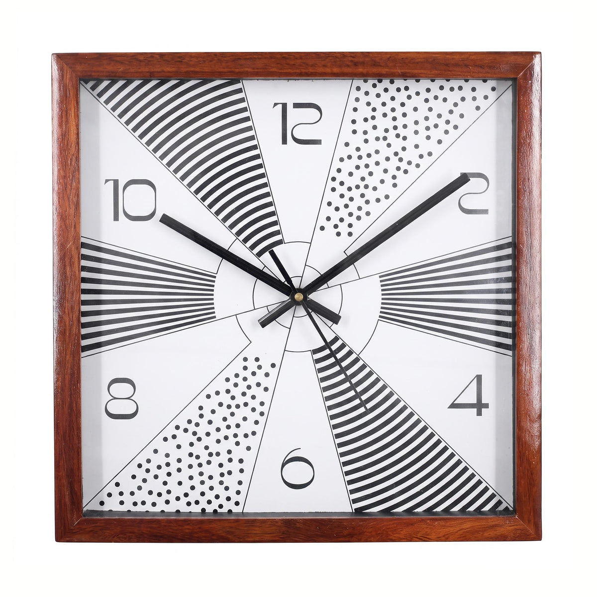 Square sunburst wall clock with black and white pattern in a creative bedroom or studio