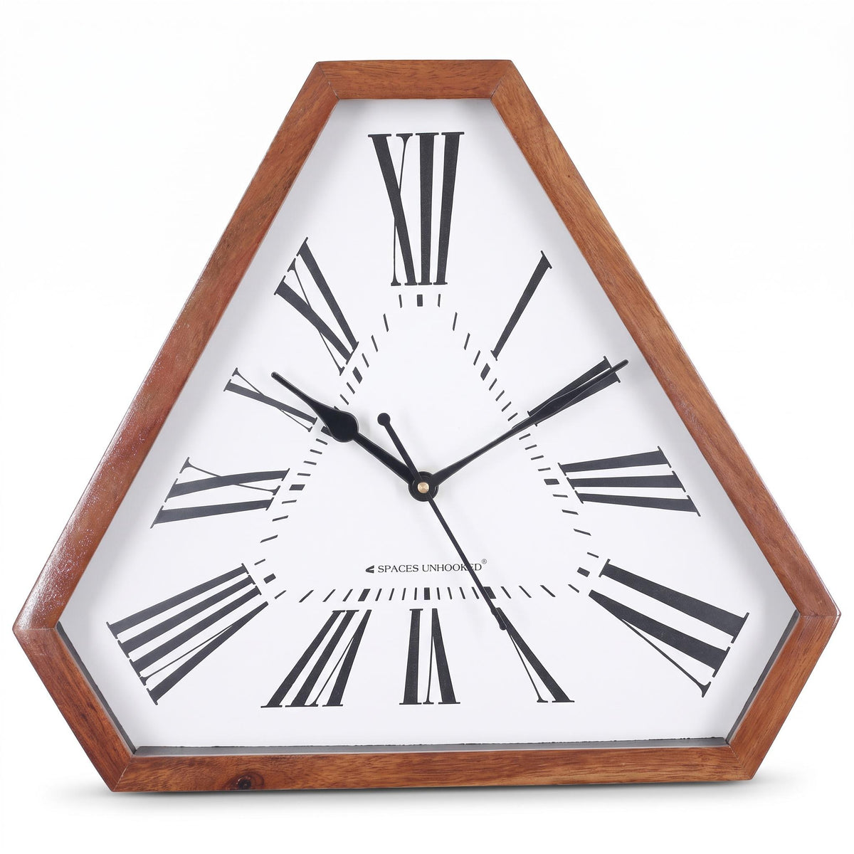 Oversized Roman numeral wooden wall clock above an entrance console with framed prints