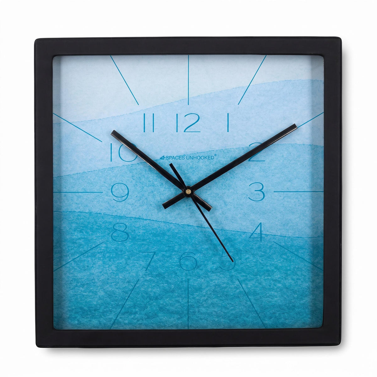 Sky blue watercolour wall clock on a living room wall above a sofa