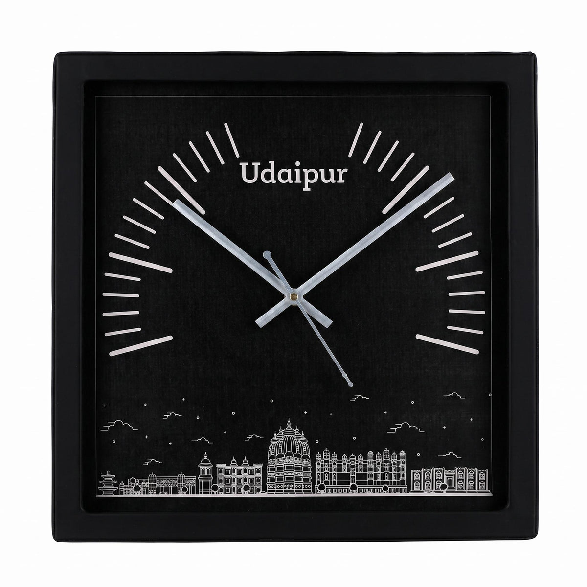 Udaipur skyline wall clock on a study wall above a desk