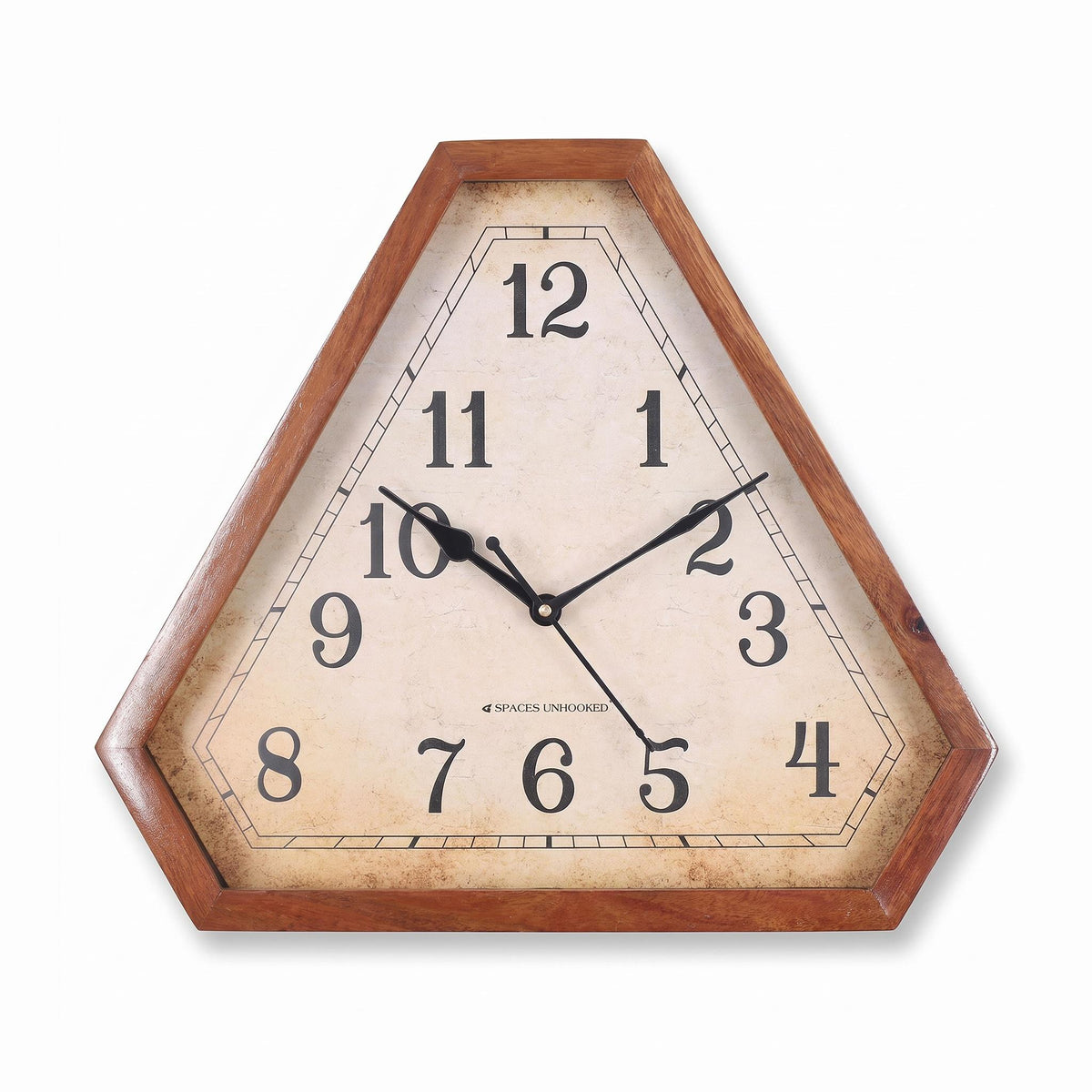 Vintage wall clock with antique dial in a study with bookshelves and brass decor