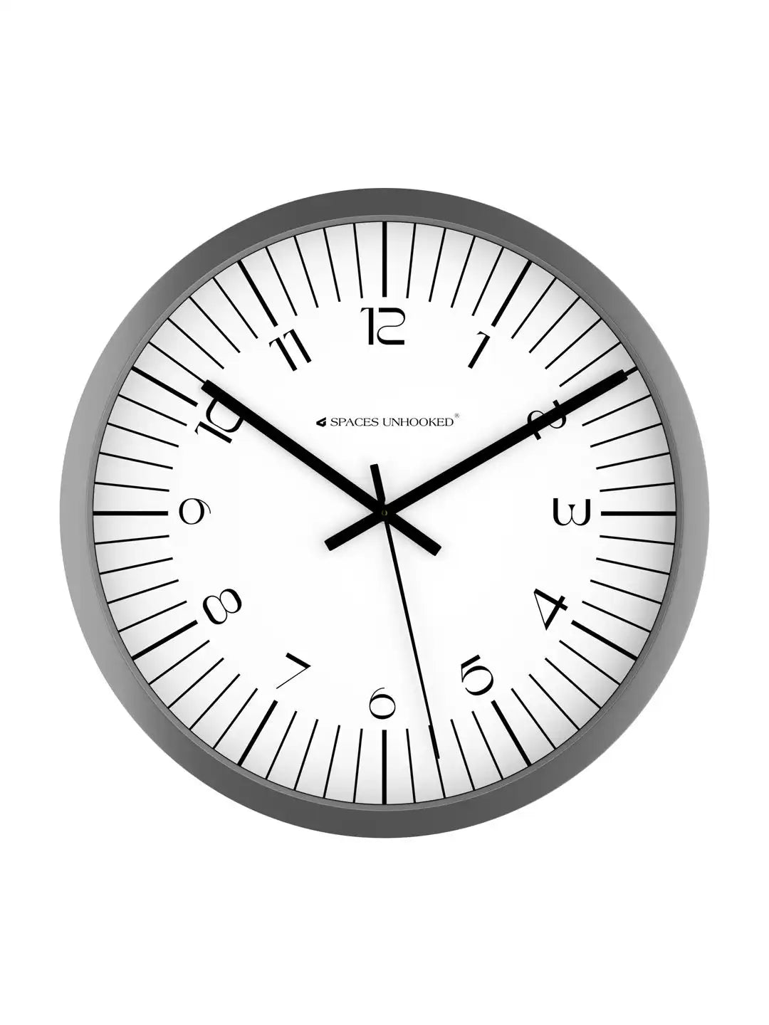 Front view of Spaces Unhooked grey round wall clock with white dial on a white background