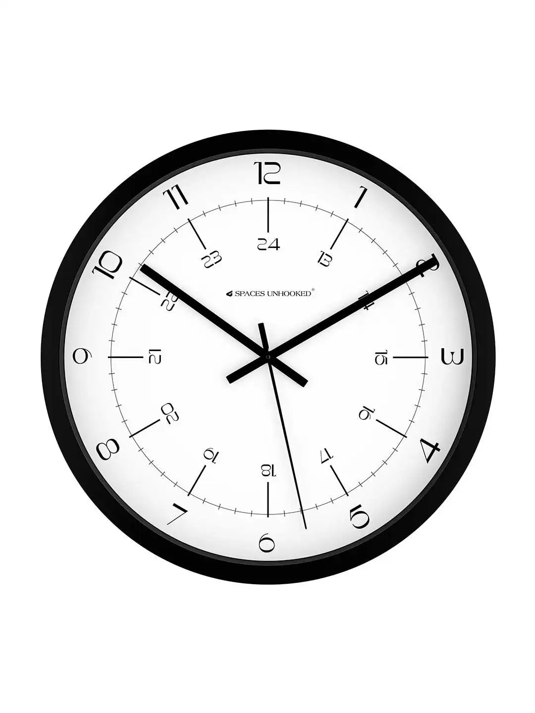 Front view of Spaces Unhooked black round wall clock with white dual time dial on white background