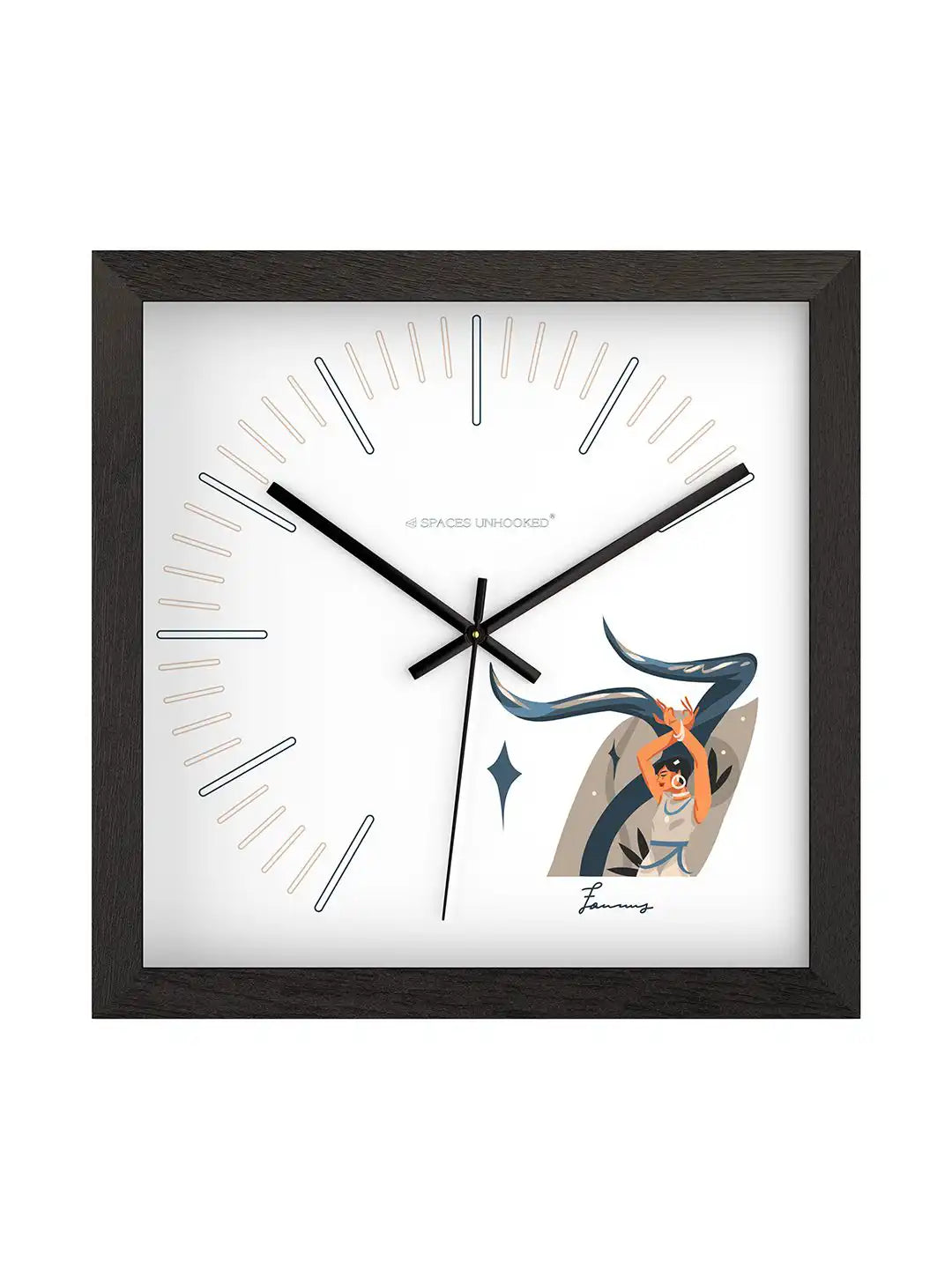 Modern black-framed wall clock mounted on a wall above a wooden table, styled with plants and neutral home décor.