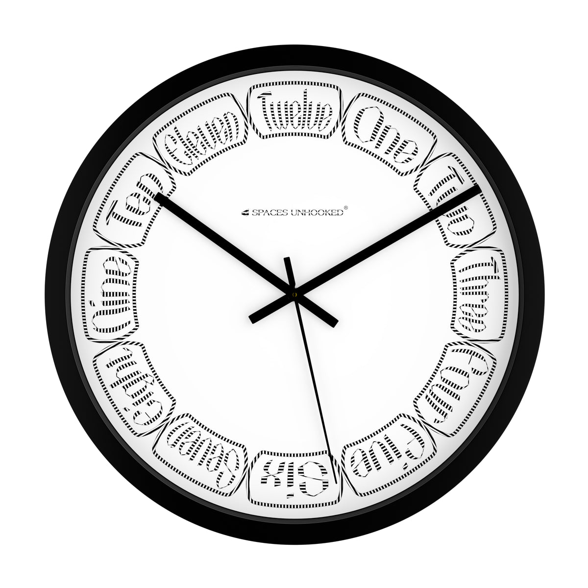 Black and white wall clock with decorative design on a white background