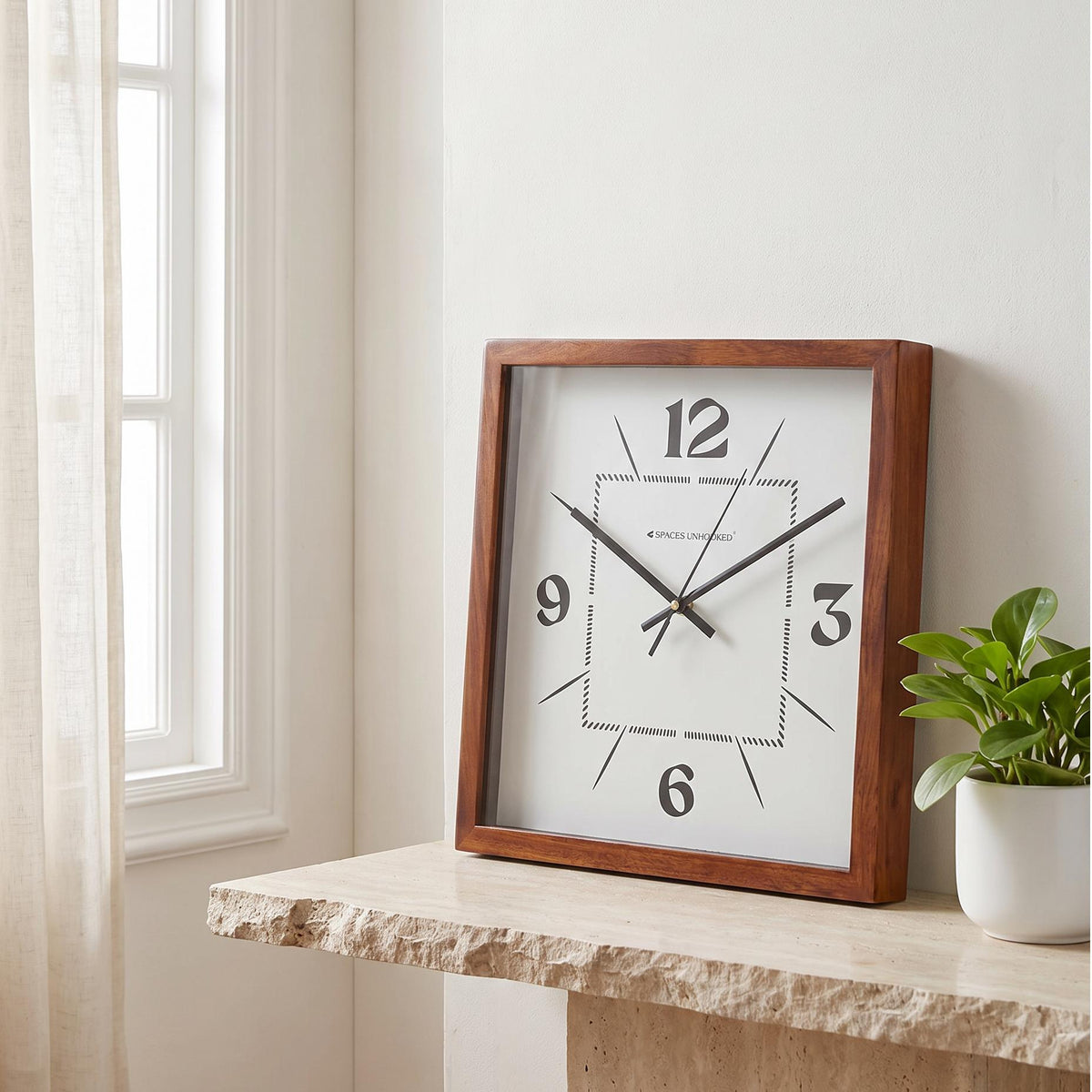 Spaces Unhooked modern square wooden wall clock with dotted inner square dial, front view