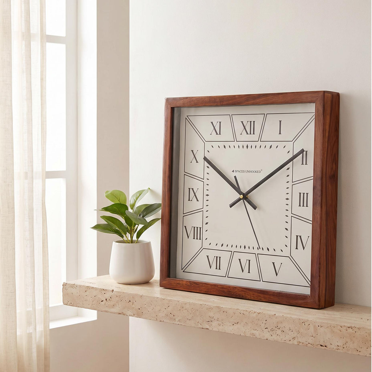 Spaces Unhooked Roman numeral square wooden wall clock with white dial, front view