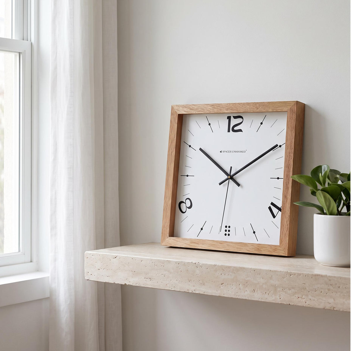 Spaces Unhooked light oak square wooden wall clock with 12, 4 and 8 numerals, front view