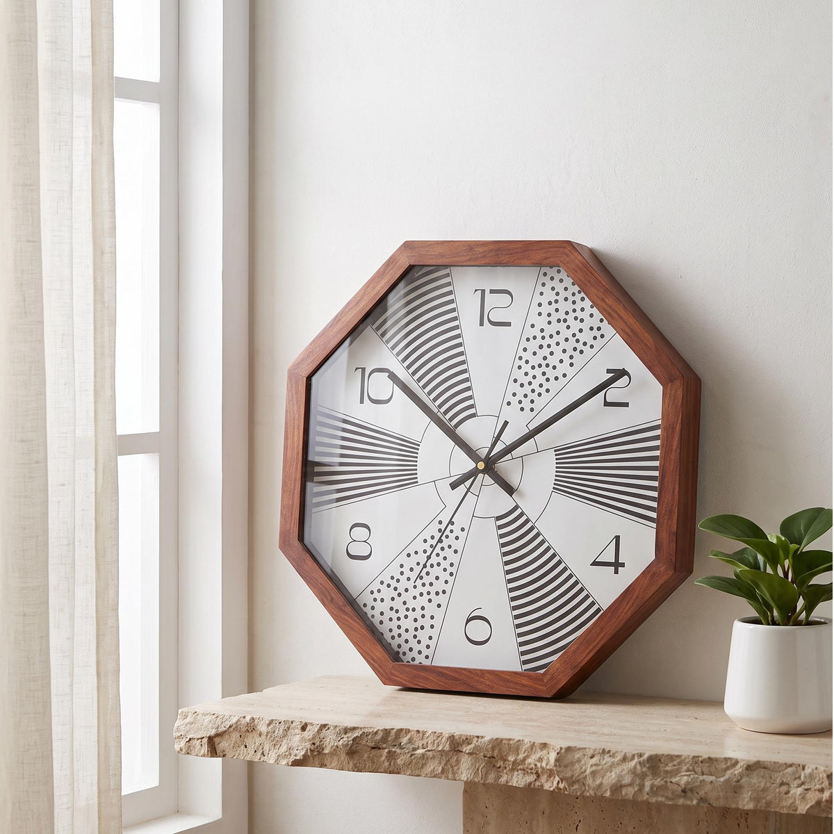 Spaces Unhooked sunburst octagonal wooden wall clock with stripes and dots dial, front view