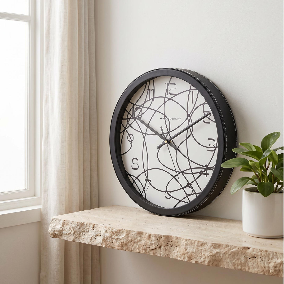 Spaces Unhooked Abstract Line Art Round Wall Clock, White Dial