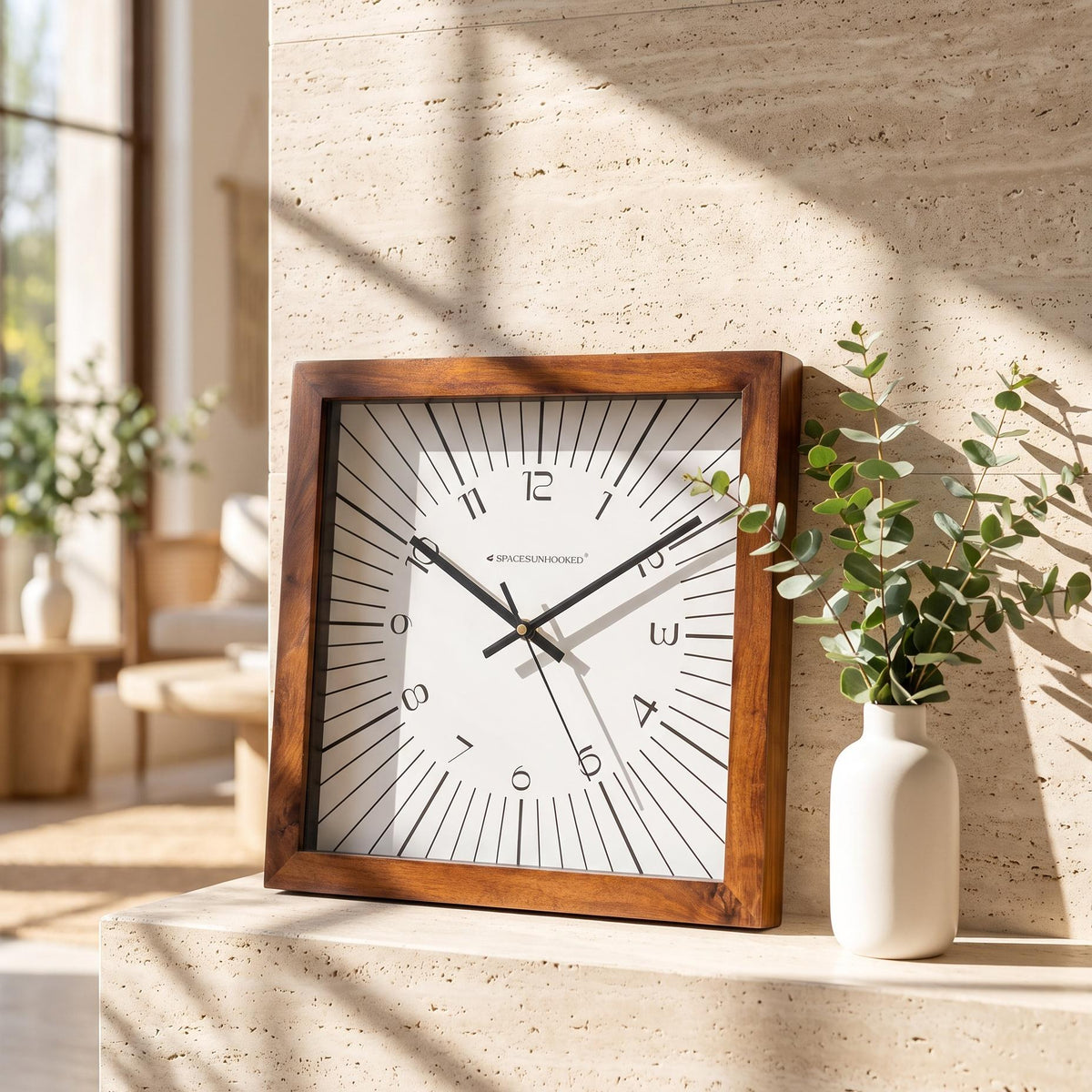 Spaces Unhooked square wooden wall clock with radiating line dial and white face, front view