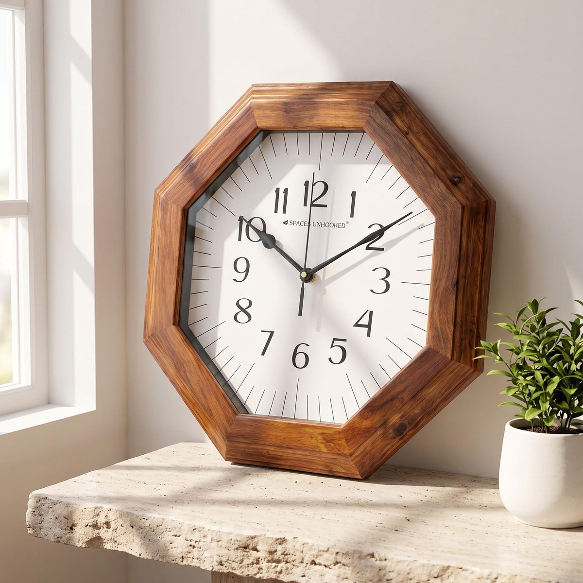 Octagonal wooden wall clock with classic numerals and minute ticks on a white dial