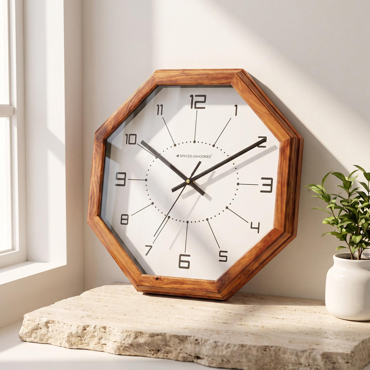 Octagonal wooden wall clock with squared numerals and a dotted inner ring on white dial