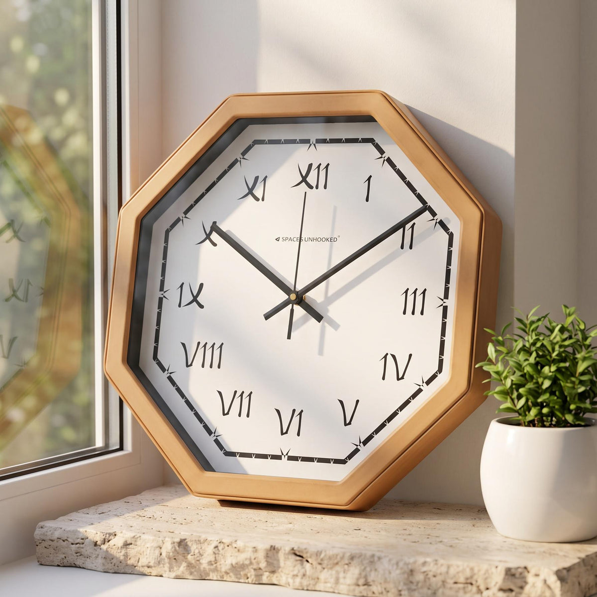 Spaces Unhooked terracotta octagonal wall clock with brush Roman numerals, front view